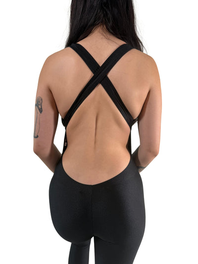 OnTheMarq DropCut™ Black Spandex Crossback Jumpsuit — open crossback design — original bathroom friendly jumpsuit — OnTheMarq proprietary DropCut™ Technology — sleek black spandex crossback jumpsuit — invented by Nita Marquez — Freedom Fashion