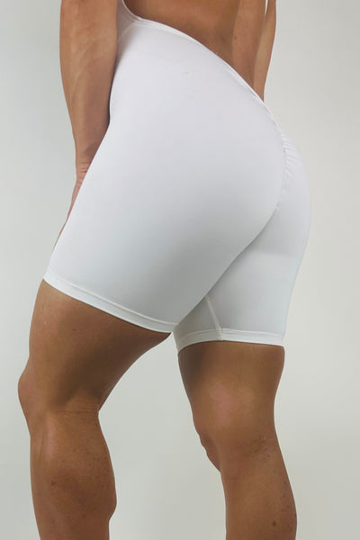 OnTheMarq DropCut™ Cloud White Shorts Jumpsuit with scrunchie rear rouging — original bathroom friendly jumpsuit — OnTheMarq proprietary DropCut™ Technology — white shorts jumpsuit — invented by Nita Marquez — Freedom Fashion