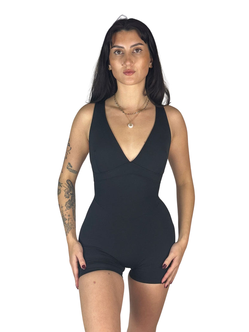 OnTheMarq DropCut™ Not-So-Basic Black Shorts Jumpsuit with scrunchie rear ruching — original bathroom friendly jumpsuit — OnTheMarq proprietary DropCut™ Technology — black shorts jumpsuit — invented by Nita Marquez — Freedom Fashion