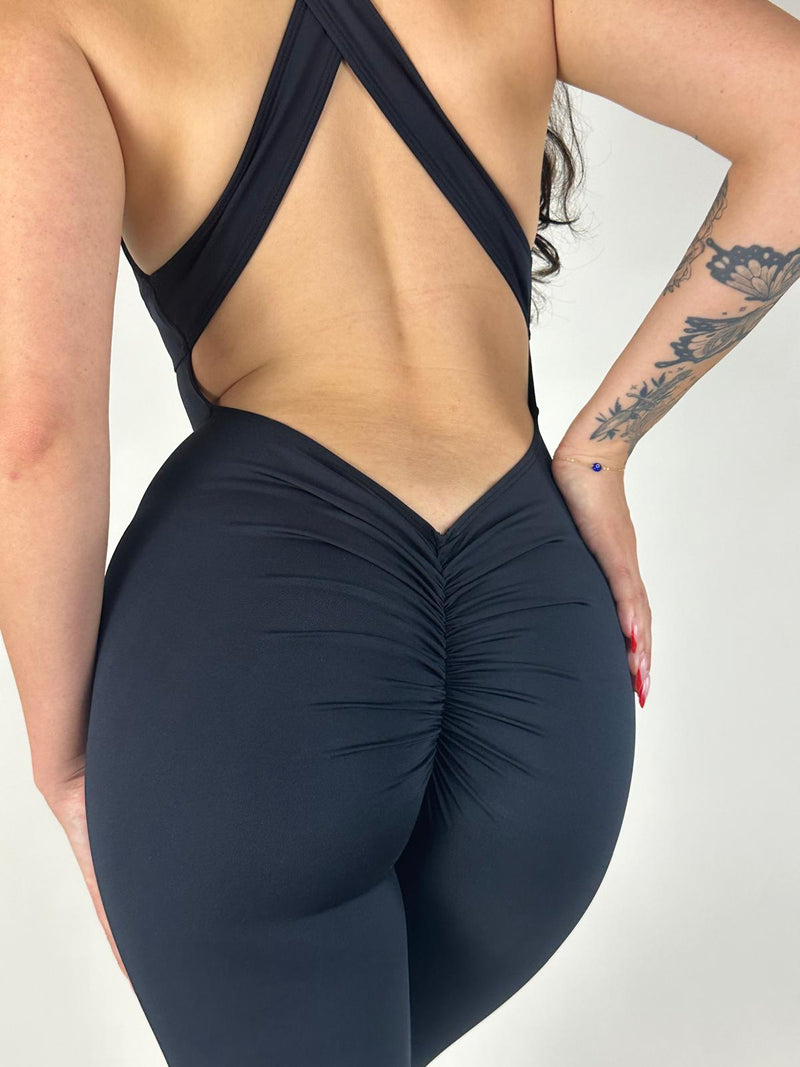 OnTheMarq DropCut™ Scrunchie Not-So-Basic Black Jumpsuit — open crossback with signature scrunchie rear rouging — original bathroom friendly jumpsuit — OnTheMarq proprietary DropCut™ Technology — invented by Nita Marquez — Freedom Fashion