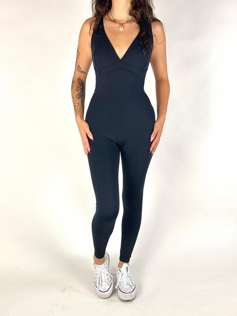 OnTheMarq DropCut™ Scrunchie Not-So-Basic Black Jumpsuit — open crossback with signature scrunchie rear rouging — original bathroom friendly jumpsuit — OnTheMarq proprietary DropCut™ Technology — invented by Nita Marquez — Freedom Fashion