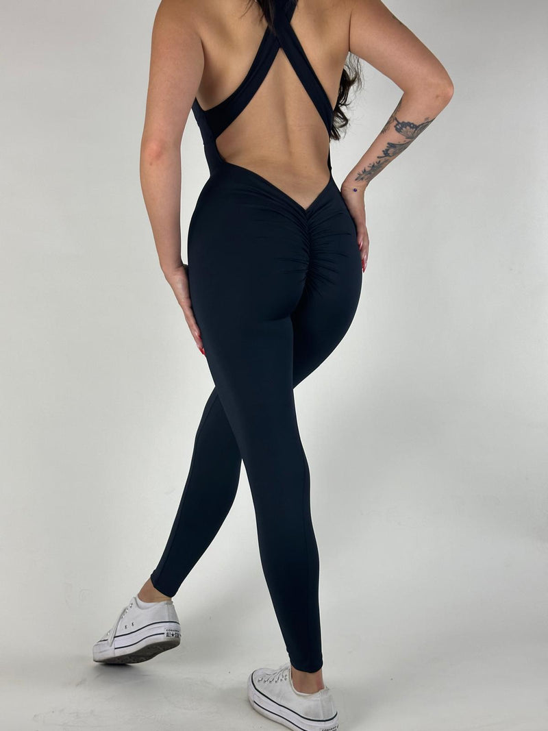 OnTheMarq DropCut™ Scrunchie Not-So-Basic Black Jumpsuit — open crossback with signature scrunchie rear ruching — original bathroom friendly jumpsuit — OnTheMarq proprietary DropCut™ Technology — invented by Nita Marquez — Freedom Fashion
