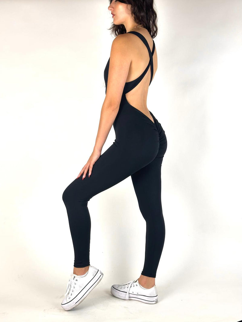 OnTheMarq DropCut™ Scrunchie Not-So-Basic Black Jumpsuit — open crossback with signature scrunchie rear ruching — original bathroom friendly jumpsuit — OnTheMarq proprietary DropCut™ Technology — invented by Nita Marquez — Freedom Fashion