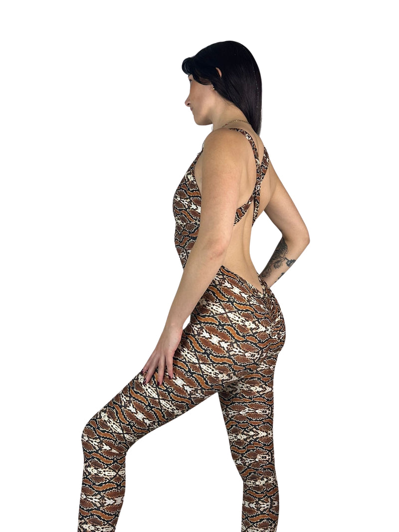 OnTheMarq DropCut™ Scrunchie Snakeskin Jumpsuit — open crossback with signature scrunchie rear ruching — original bathroom friendly jumpsuit — OnTheMarq proprietary DropCut™ Technology — brown cream black snakeskin print crossback jumpsuit — invented by Nita Marquez — Freedom Fashion