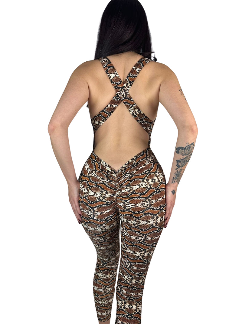 OnTheMarq DropCut™ Scrunchie Snakeskin Jumpsuit — open crossback with signature scrunchie rear ruching — original bathroom friendly jumpsuit — OnTheMarq proprietary DropCut™ Technology — brown cream black snakeskin print crossback jumpsuit — invented by Nita Marquez — Freedom Fashion