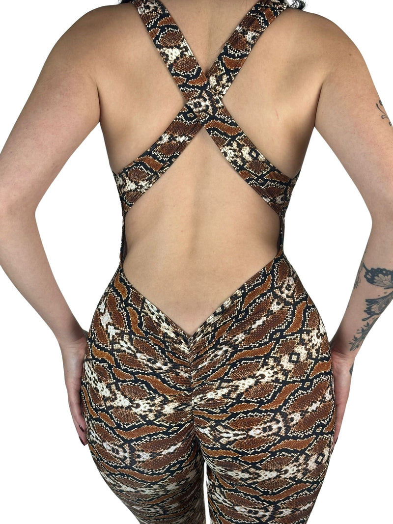 OnTheMarq DropCut™ Scrunchie Snakeskin Jumpsuit — open crossback with signature scrunchie rear ruching — original bathroom friendly jumpsuit — OnTheMarq proprietary DropCut™ Technology — brown cream black snakeskin print crossback jumpsuit — invented by Nita Marquez — Freedom Fashion