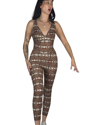OnTheMarq DropCut™ Snakeskin Jumpsuit — original bathroom friendly jumpsuit — OnTheMarq proprietary DropCut™ Technology — brown cream black snakeskin print compression jumpsuit — invented by Nita Marquez — Freedom Fashion